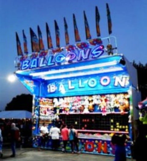 carnival games balloon popping booth